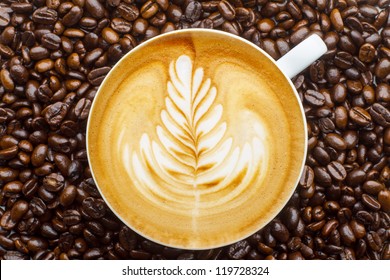 Latte Art, Coffee In Coffee Beans Background