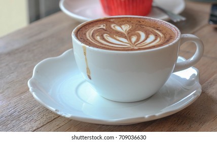 latte art coffee in cafe - Shutterstock ID 709036630