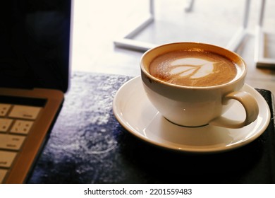 Latte art on hot milk coffee, stock photo