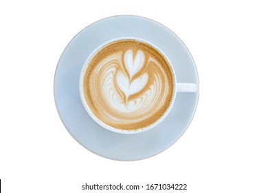 Latte art in a white coffee mug on a white background