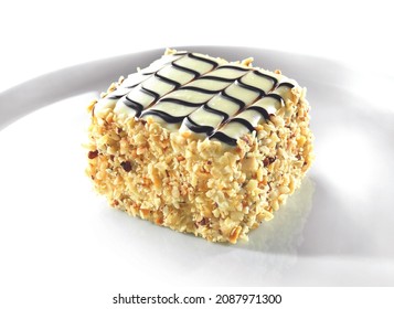 Latte cake hazelnut white background isolated - Shutterstock ID 2087971300
