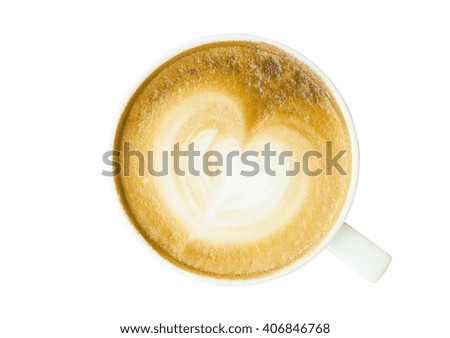 A Latte Coffee art on the black desk.
