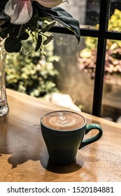 Latte coffee decorated with milk