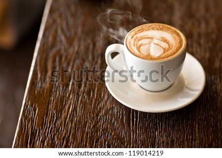 latte on a wood table