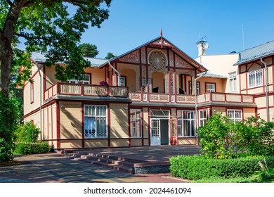 LATVIA, JURMALA, JULY, 2021 - Exterior view renovation wooden home in Jurmala, Latvia. Traditional Jurmala architecture.