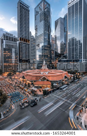 Lau Pa Sat Festival Market, Singapore in front of Singapore Skyline