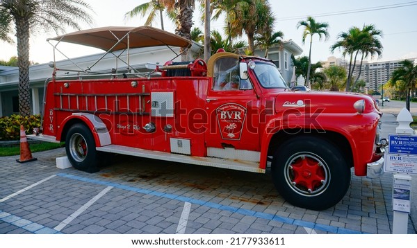 Lauderdale-by-the-Sea, USA - May\
09, 2022: Red Ford Big Job F800 fire truck. Lauderdale by the Sea\
fire\
department.