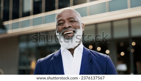 Similar – Image, Stock Photo Business black man in suit leaving the office holding his work briefcase and using smartphone