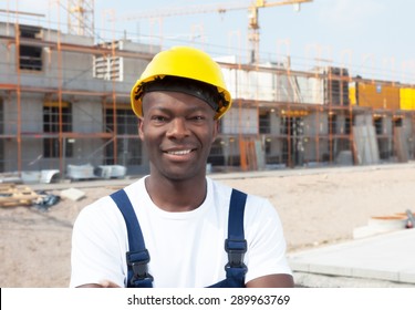 Laughing African American Construction Worker At Building Site