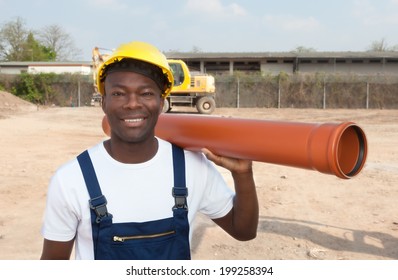 Laughing African Worker With Pipe