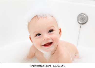 Laughing Baby With Soap Foam On Head