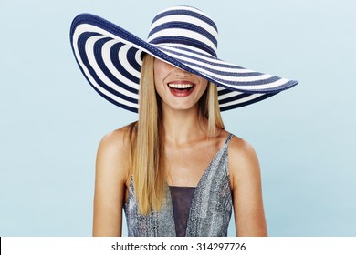 Laughing Blond Woman In Summer Hat