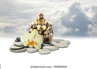 Laughing Buddha or Budai statue, yellow orchid flower, zen stone and sky reflected in sea