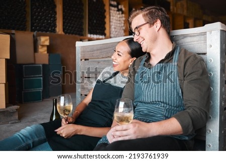 Laughing friends, wine tasting and couple with happy smile bonding on countryside farm with drink glass. Interracial man, woman or industry worker people in environment vineyard restaurant