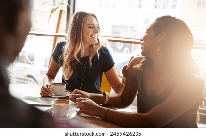 Laughing, friends or women in coffee shop for support, funny conversation or gossip news together. Happy, talking or people speaking of drinking espresso or tea in discussion or chat in cafe diner - Powered by Shutterstock