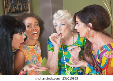 Laughing group of women smoking a joint