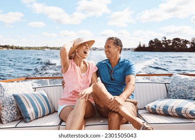 Laughing, happy couple and on a boat for retirement travel, summer freedom and holiday in Bali. Smile, love and a senior man and woman on a yacht for vacation adventure, luxury and a cruise date - Shutterstock ID 2301505043