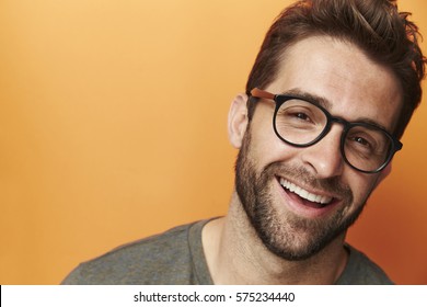 Laughing man in spectacles, portrait