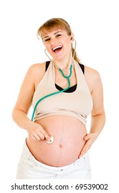 Laughing Pregnant Woman Holding Stethascope On Her Belly Isolated On White