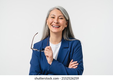 Laughing smiling caucasian mature middle-aged woman businesswoman teacher boss CEO tutor in formal suit and glasses looking at camera isolated in white background. Stomatology, dentistry concept - Powered by Shutterstock