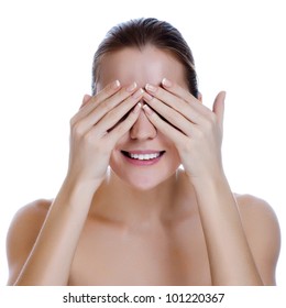 Laughing Woman Covering Her Eyes, Close Up Of A Womans Laughing Mouth And Teeth With Her Hands Covering Her Eyes.