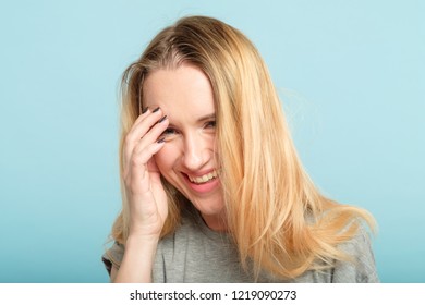 Laughing Woman Embarrassed With Her Silliness Covering With Hand. Facepalm Failure And Shame Concept.