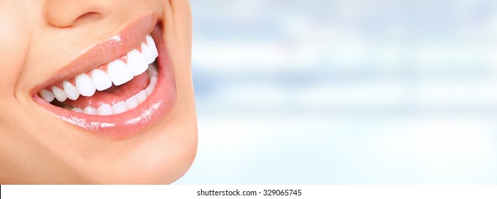 Laughing Woman Mouth With Great Teeth Over Blue Background.
