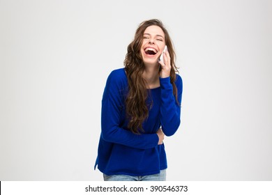 Laughing Woman Talking On The Phone Isolated On A White Background