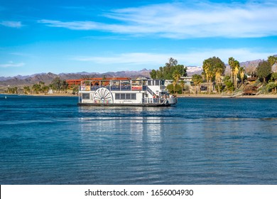 Laughlin, NV / USA – February 16, 2020: Operated by Laughlin River Tours, the Celebration River Boat tours along the Colorado River between Laughlin, Nevada and Bullhead City, Arizona.