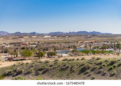 Laughlin, NV / USA – February 19, 2020: Business property view from Laughlin, Nevada, toward Bullhead City, Arizona, with the Colorado River in between as the state border.