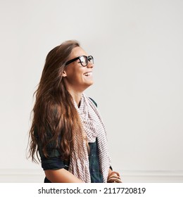 Laughter And Relaxation. Shot Of A Stylish Young Woman Laughing.