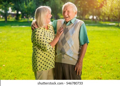 Laughter Of Senior Couple. Man And Woman Outdoor. Good Sense Of Humour. Mood Shapes Health.