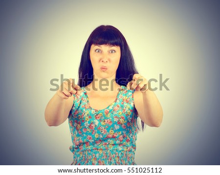 Laughter Young woman in green dress. Haughty kind person. Isolated