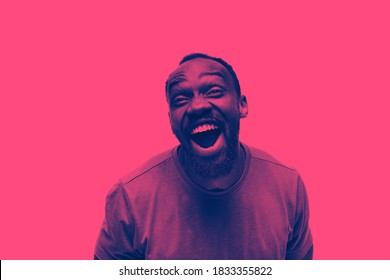 Laughting. Close up portrait of african man isolated on studio background. Modern and trendy duotone effect. Concept of human emotions, facial expression. Copyspace for ad. People in halftones.