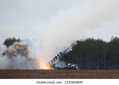 Launch Of Military Missiles (rocket Artillery) At The Firing Field During Military Exercise