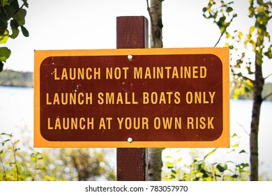 A launch not maintained use at own risk sign.