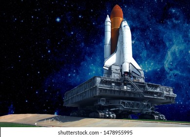 The launch pad of the spaceship, against the background of the beautiful star sky.  Elements of this image were furnished by NASA - Powered by Shutterstock