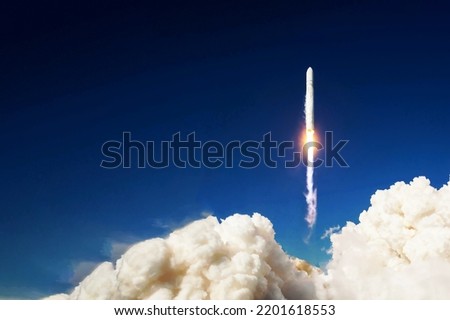Launch of a space rocket into space. Elements of this image furnished by NASA. High quality photo