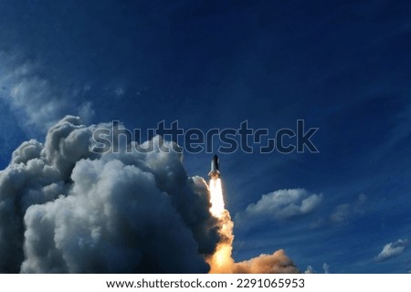 The launch of a space rocket into space. Elements of this image furnished NASA. 