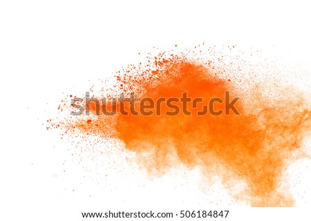 Launched orange powder on black background