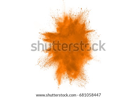 Launched orange powder on black background
