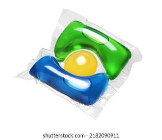 Laundry detergent pod blue, green and yellow colored isolated on white background.