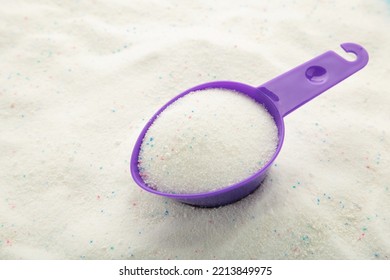 Laundry Detergent Powder For Washing Machine And Plastic Scoop For Dosage. Top View