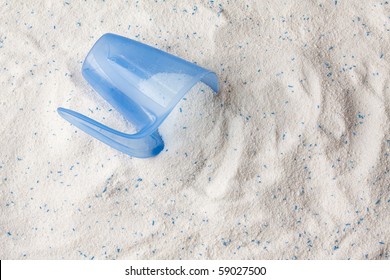 Laundry Detergent Powder For Washing Machine And Plastic Scoop For Dosage.