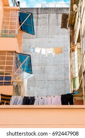 Laundry On Clothes Line Between Two Buildings (Porto, Portugal)