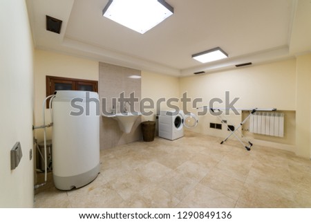 Laundry room with boiler