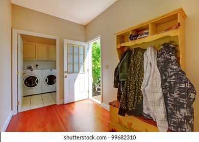 Laundry Room With Mud Room And Clothes.