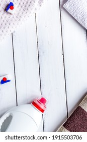 Laundry Set With Towels And Plastic Bottel White Background Top View Mockup