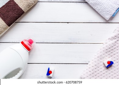 Laundry Set With Towels And Plastic Bottel White Background Top View Mockup