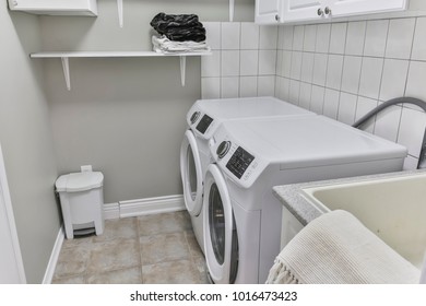 laundry. A washing and dryer machine at home